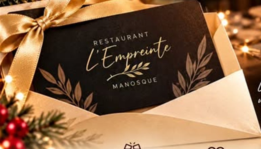 Bon cadeau L’Empreinte dans une enveloppe dorée, noeud doré